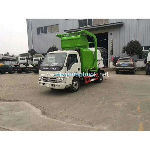 Front loading animal innocuous treatment vehicle